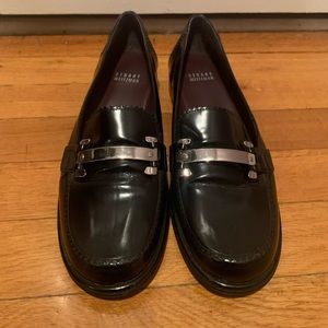 Stuart Weitzmqn black patent leather loafers with sliver hardware